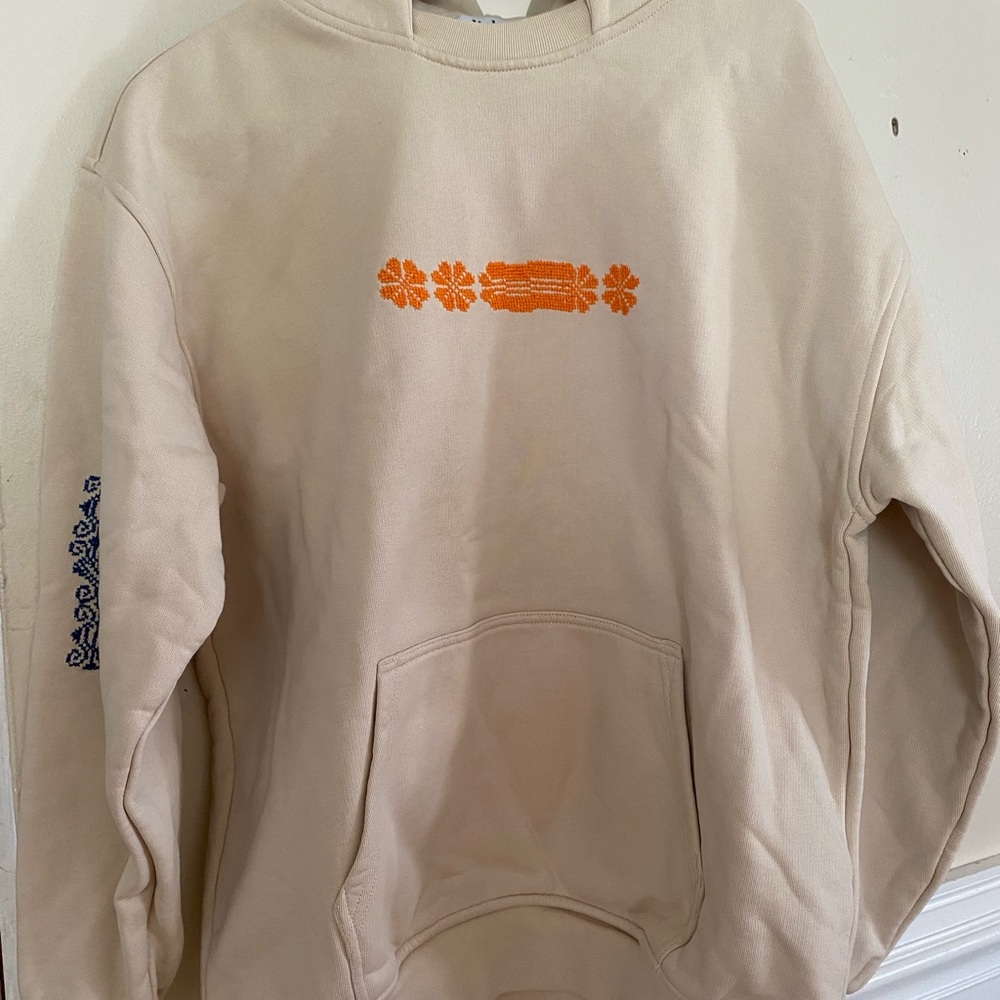 A tan Adish hoodie in great condition